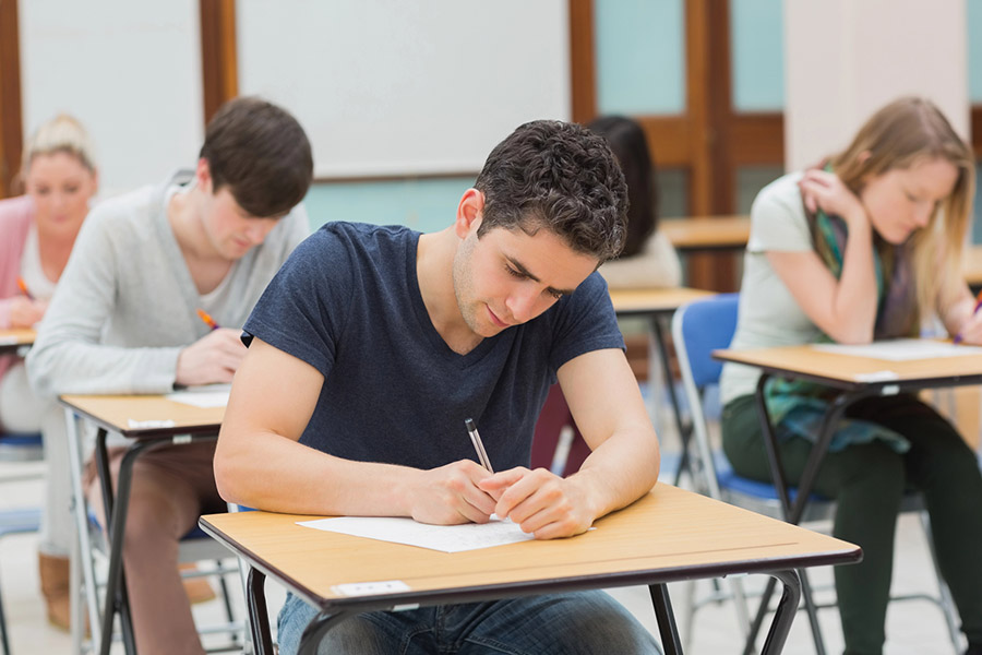 Students taking a test in a classroom in Richmond